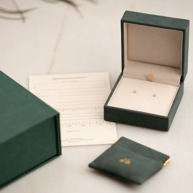 SOLITAIRE DIAMOND STUD EARRING - 0,21ct. - YG