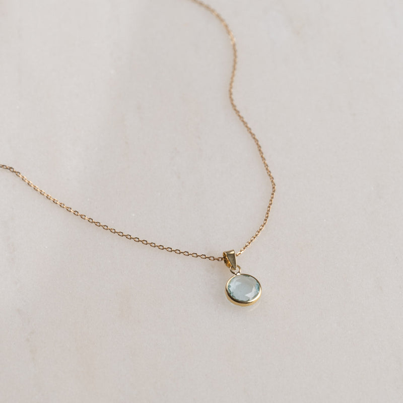 EVE BLUE TOPAZ SOLID GOLD PENDANT