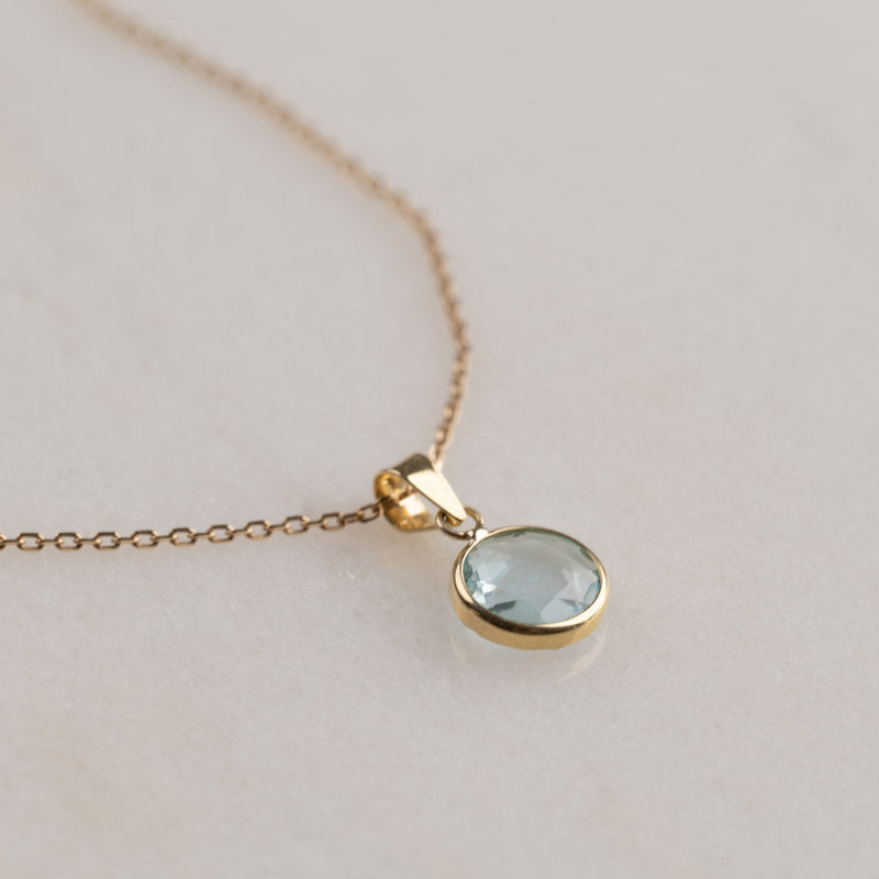 EVE BLUE TOPAZ SOLID GOLD PENDANT