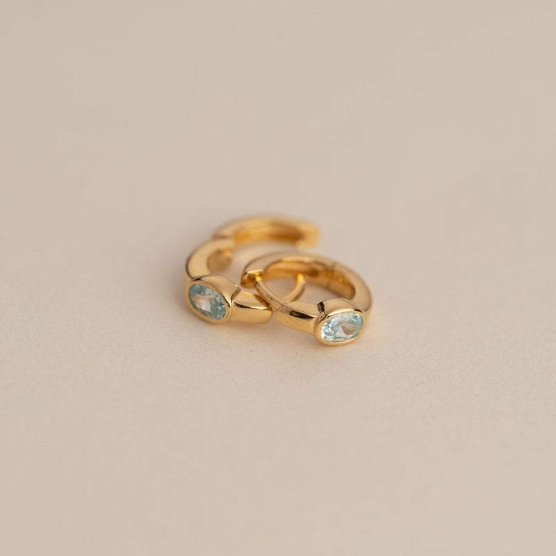 REBEKKA BLUE GOLDEN CREOL EARRING