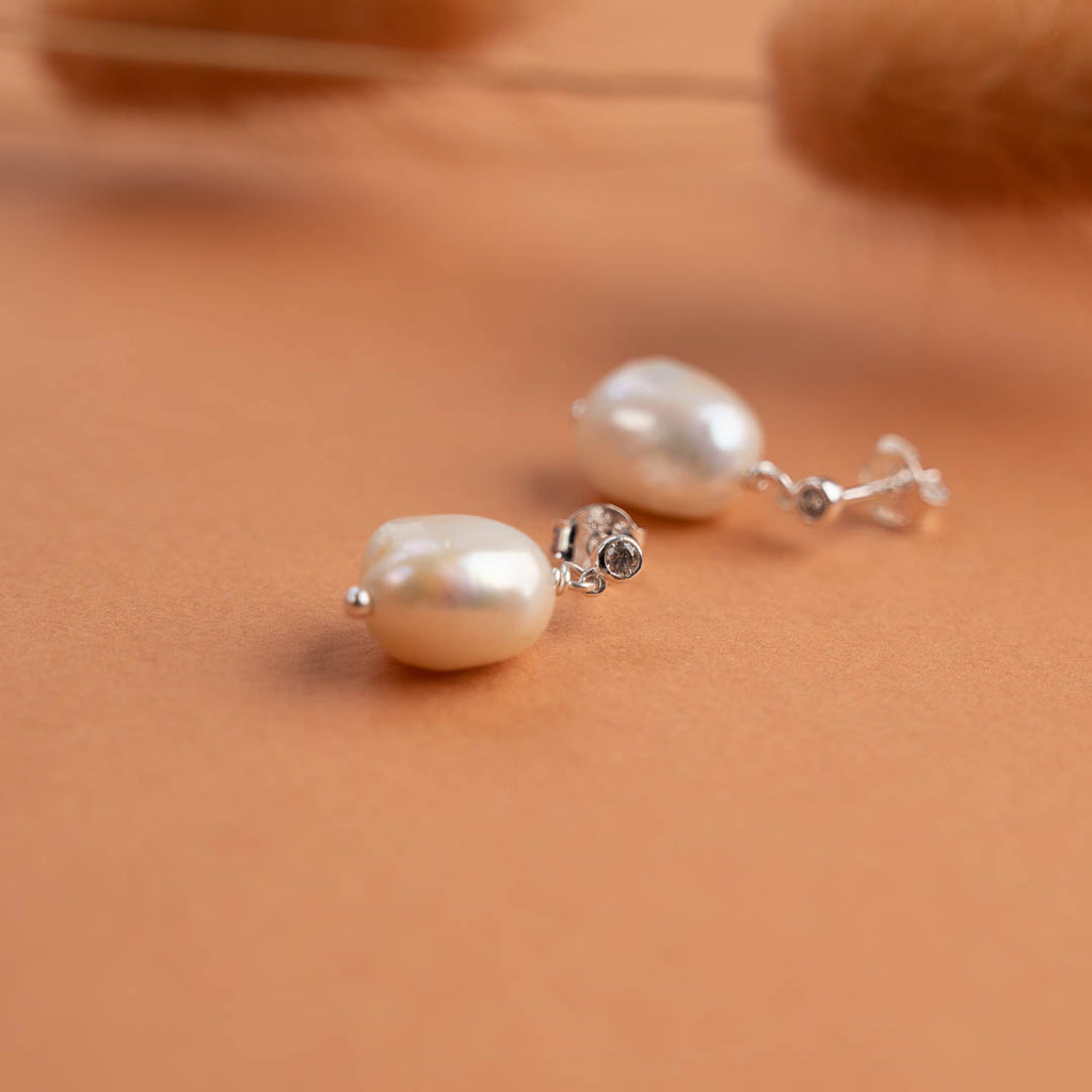 Guldbelagt sølv medium øreringe smykker tilpasset til specielle lejligheder besøg smykkebutik østerbrogade sisi copenhagen.
