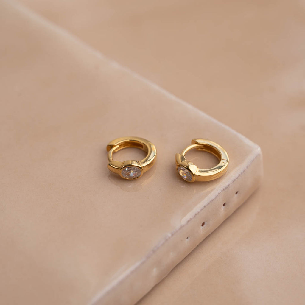 Forgyldt sterlingsølv små creoler øreringe hjerte symbol emalje lang levetid garanti på alle smykker besøg smykkebutik østerbro sisi copenhagen.